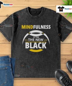 Good Mindfulness is the New Black washed t-shirt displayed on a hanger, showcasing a trendy design for mindful living.