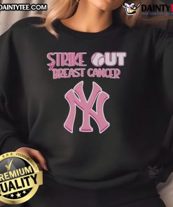 Good New York Yankees Strike Out Breast Cancer sweatshirt featuring bold graphics and team colors for a charitable cause.