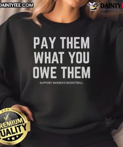 Support women's basketball with a stylish 'Good Pay Them What You Owe Them' sweatshirt, perfect for fans and players alike.