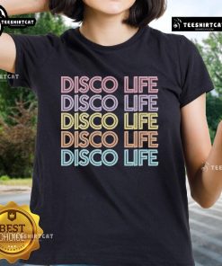 Good Say She She Disco Life Repeat Ladies Tee featuring vibrant graphic design on a stylish women's shirt.