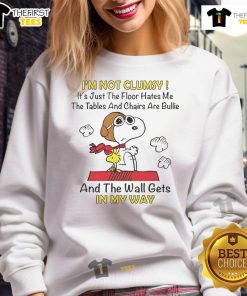 Good Snoopy and Woodstock sweatshirt with 'I'm not clumsy, it's just the floor hates me' text, perfect for fans.