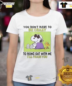 Alt Text: Good Snoopy and Woodstock tee featuring 'You Don't Have to Be Crazy to Hang Out with Me, I'll Train You' design.