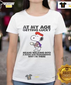 Good Snoopy tee for women: 'Getting Lucky Means Walking Into a Room and Remembering Ladies' graphic shirt design.