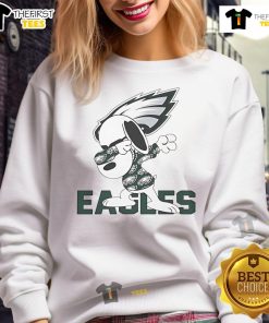 Alt Text: Good Snoopy dabbing in a Philadelphia Eagles sweatshirt, showcasing team spirit and playful style.