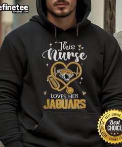 Alt Text: Nurse wearing a Jacksonville Jaguars hoodie, showcasing her team spirit and love for football in a hospital setting.