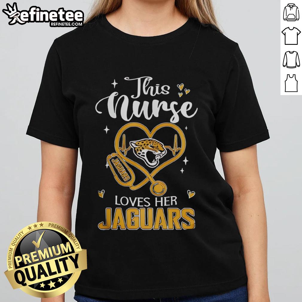 Good This Nurse Love Her Jacksonville Jaguars Ladies Tee Nurse wearing a Jacksonville Jaguars ladies tee, showcasing team spirit and love for football in a vibrant design.
