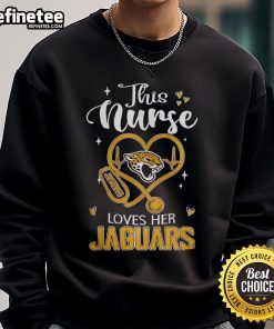 Alt Text: Nurse wearing a Jacksonville Jaguars sweatshirt, showcasing her team spirit and love for football.
