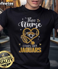 Alt Text: Nurse wearing a Jacksonville Jaguars T-shirt, showcasing her love for the team with a cheerful smile.
