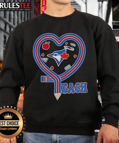 Alt Text: Good Toronto Blue Jays Teach Love Teaching Sweatshirt featuring a stylish design for educators and baseball fans.
