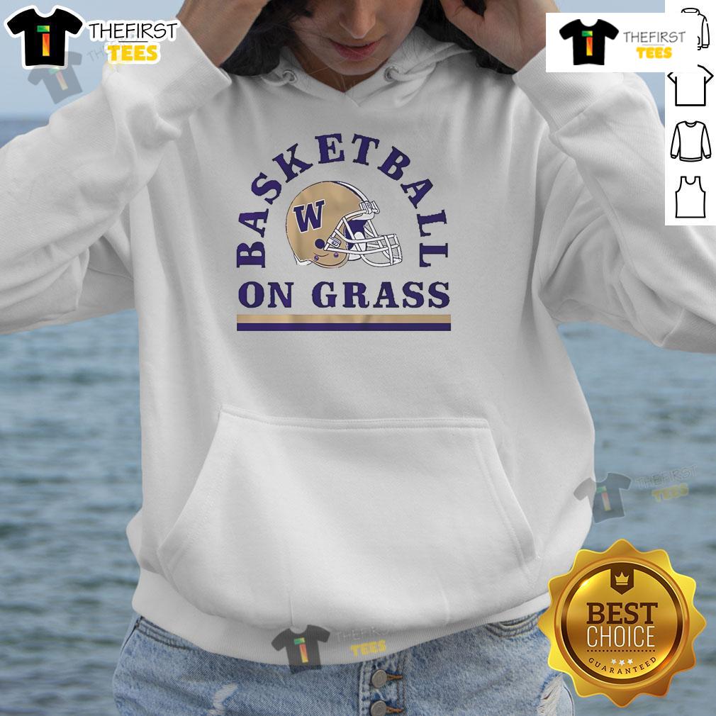 Good Washington Huskies Football Basketball On Grass Helmet Hoodie Alt Text: Washington Huskies football helmet and basketball hoodie on grass, showcasing team spirit and athletic gear.