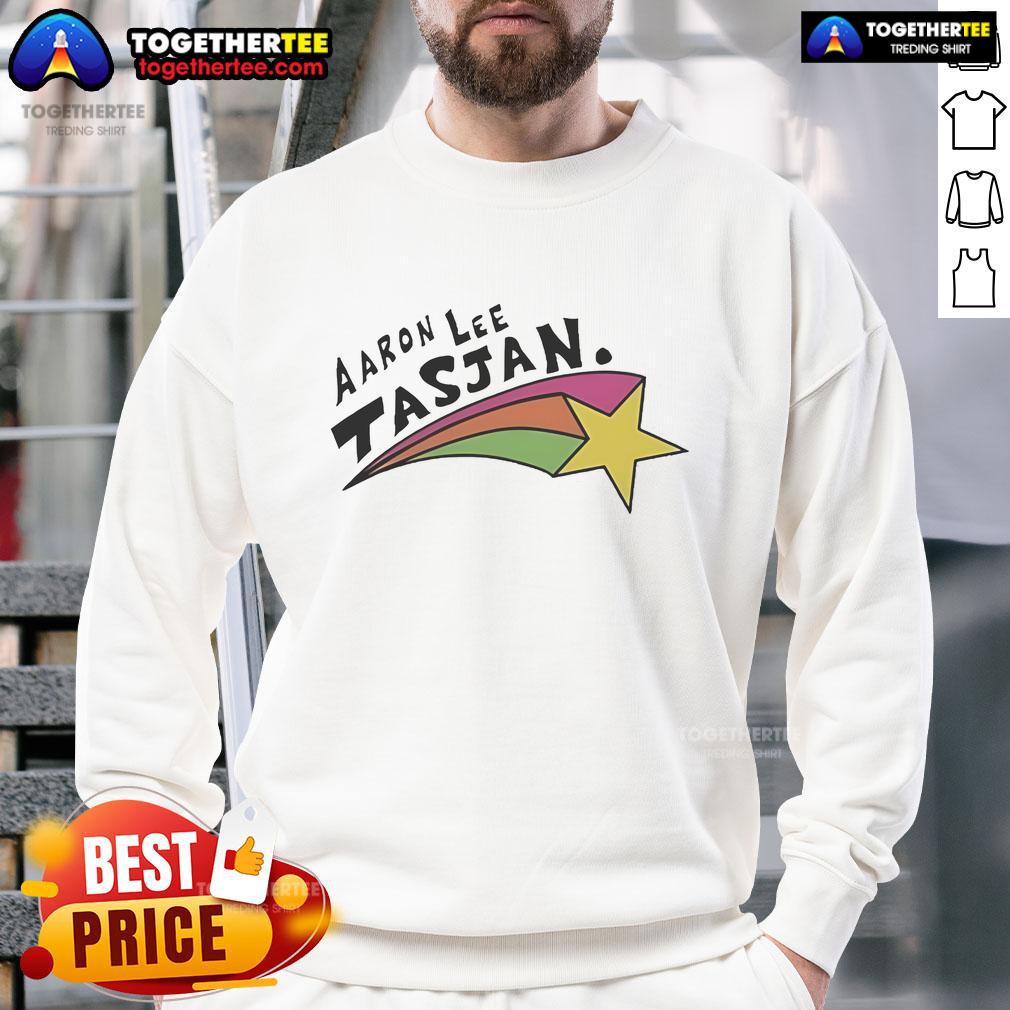 Happy Aaron Lee Tasjan Rainbow Star Sweatshirt Happy Aaron Lee Tasjan wearing a colorful rainbow star sweatshirt, showcasing his vibrant style and personality.