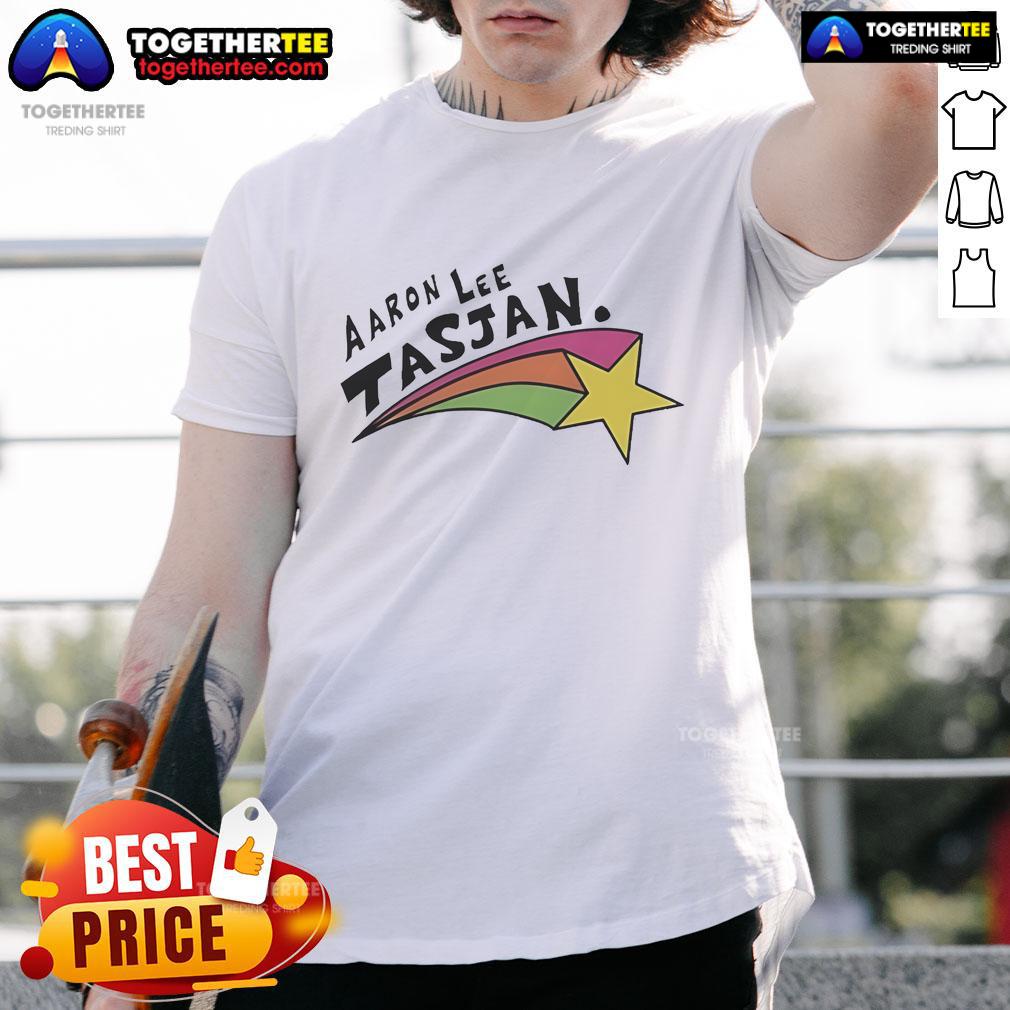 Happy Aaron Lee Tasjan Rainbow Star T Shirt Alt Text: Happy Aaron Lee Tasjan wearing a colorful rainbow star t-shirt, showcasing vibrant design and joyful expression.