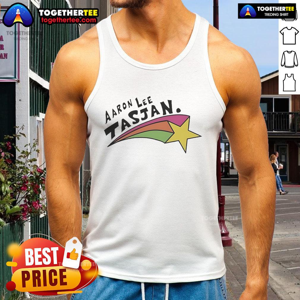 Happy Aaron Lee Tasjan Rainbow Star Tank Top Happy Aaron Lee Tasjan wearing a colorful rainbow star tank top, radiating joy and style at a vibrant outdoor event.