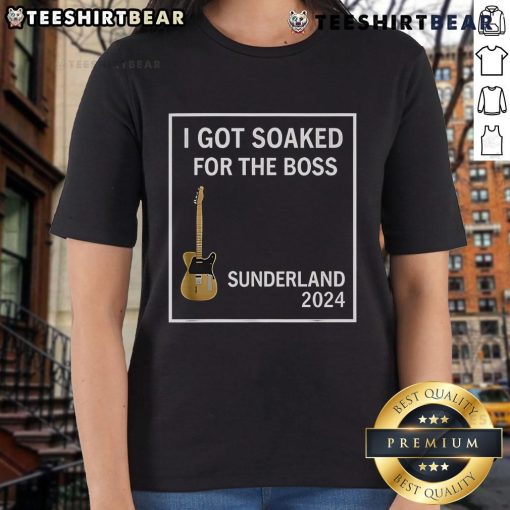 Alt Text: Happy woman wearing a Sunderland 2024 ladies tee, soaked and smiling, showcasing team spirit and joy.