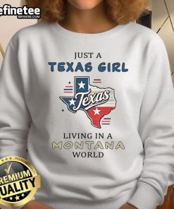 Happy Texas girl wearing 'Just A Texas Girl Living In A Montana World' sweatshirt, enjoying the scenic Montana landscape.