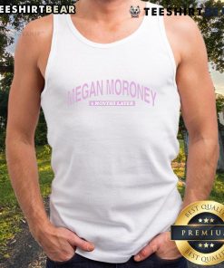 Happy Megan Moroney wearing a stylish tank top, 6 months later, showcasing her vibrant fashion sense and confident smile.