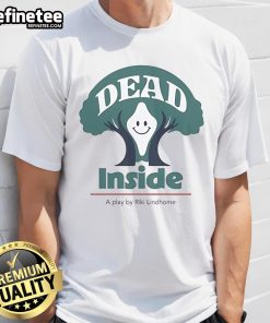 Happy Riki Lindhome wearing a 'Dead Inside' play T-shirt, showcasing a fun and quirky graphic design.