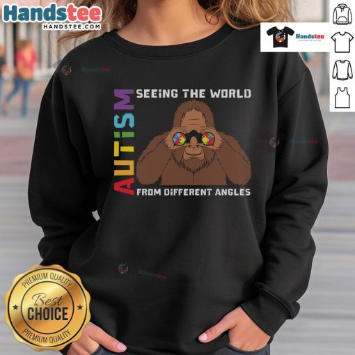 Cozy sweatshirt featuring Bigfoot and binoculars, celebrating autism and seeing the world from different angles.