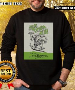 Travis Barker wearing a Nice Blink-182 Run sweatshirt during the Hit Pavement Tour 2025, showcasing vibrant tour merchandise.