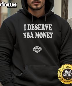 Caitlin Clark wearing a stylish WNBA hoodie with 'I Deserve NBA Money' slogan, showcasing her support for equality.