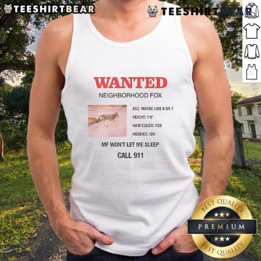 Charli XCX wears a stylish Wanted Neighborhood Fox tank top in a vibrant outdoor setting.
