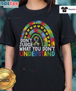 Rainbow puzzle piece ladies tee with 'Don't Judge What You Don't Understand' for Autism Awareness.
