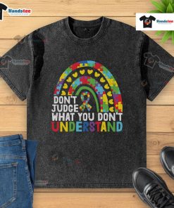 Alt Text: Rainbow puzzle piece t-shirt promoting autism awareness with the phrase 'Don't Judge What You Don't Understand'