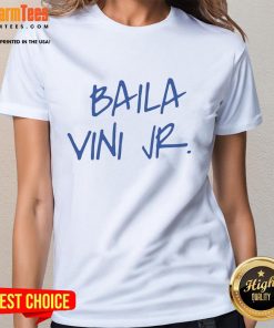 Alt Text: Eduardo Camavinga proudly wearing the Baila Vini Jr. ladies tee, showcasing style and soccer passion.