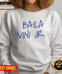 Eduardo Camavinga wearing a stylish Baila Vini Jr sweatshirt, showcasing his trendy fashion and football passion.