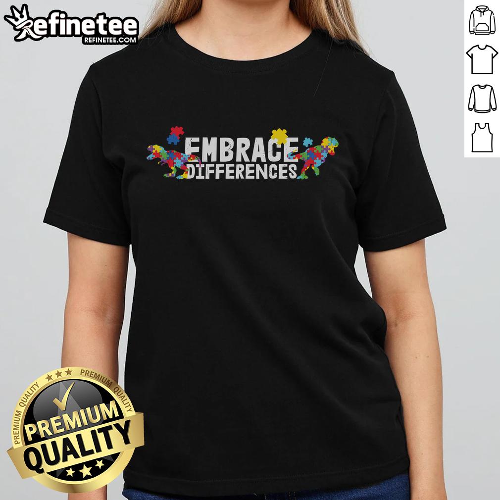 Nice Embrace Differences Autism Awareness Puzzle Dinosaur Ladies Tee Colorful 'Nice Embrace Differences' autism awareness puzzle dinosaur graphic on a ladies tee shirt, promoting inclusivity.