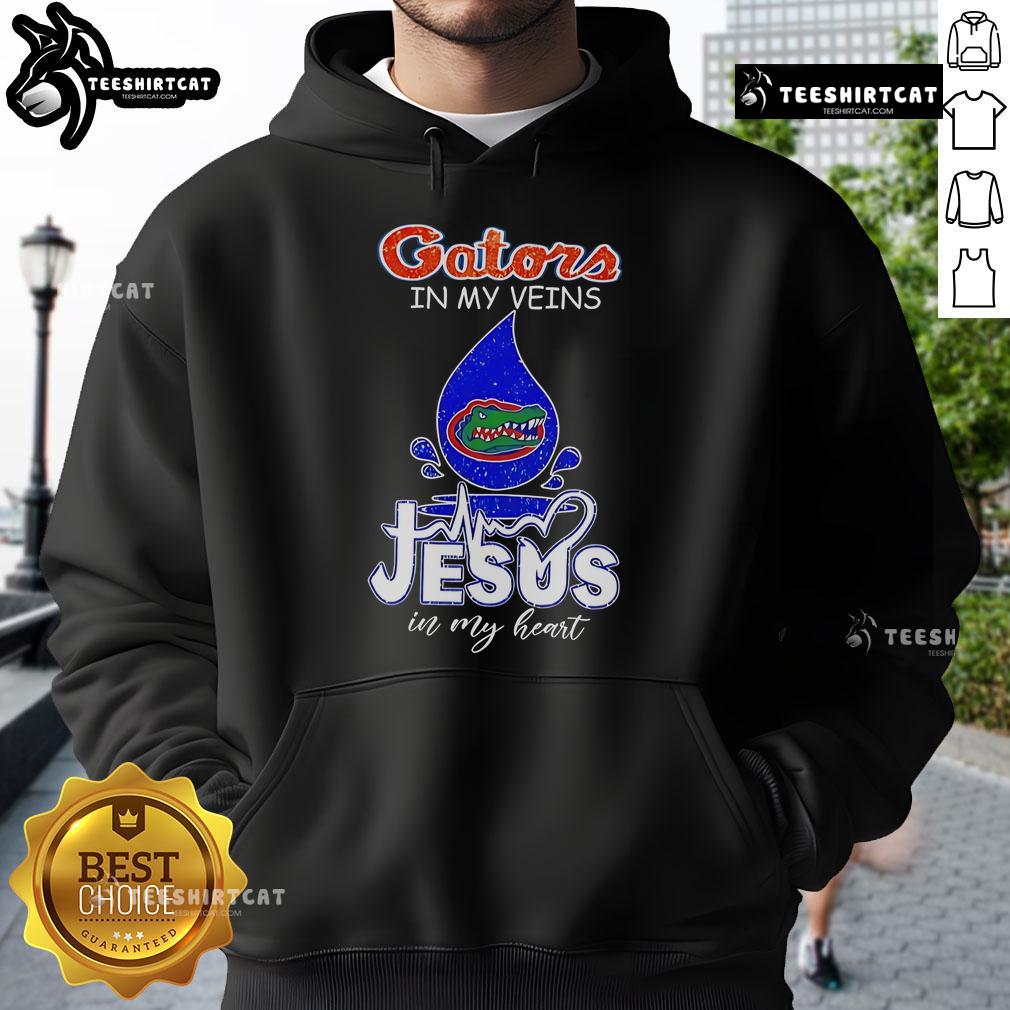 Nice Florida Gators In My Veins Jesus In My Heart Hoodie Florida Gators hoodie with 'Gators in My Veins, Jesus in My Heart' design, perfect for fans and casual wear.
