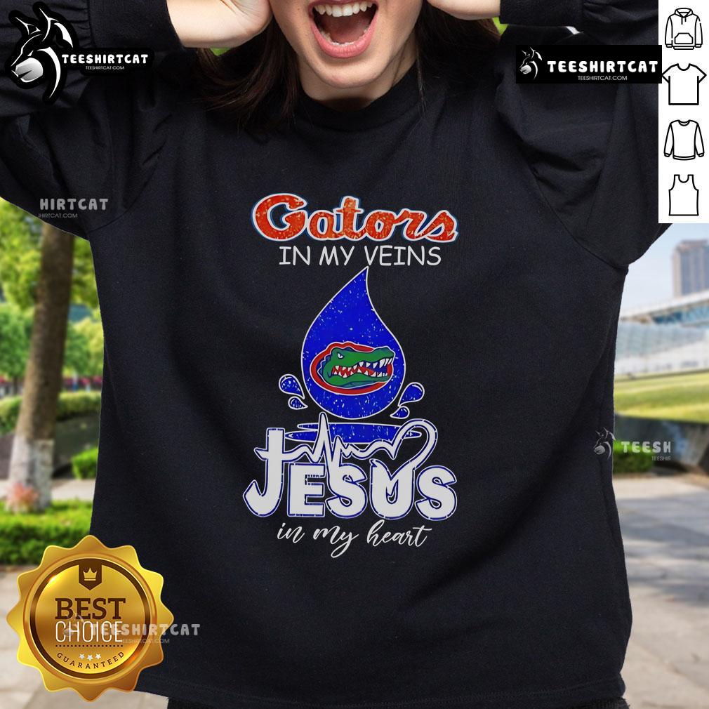 Nice Florida Gators In My Veins Jesus In My Heart Sweatshirt Nice Florida Gators in My Veins Jesus in My Heart sweatshirt featuring vibrant colors and bold lettering.