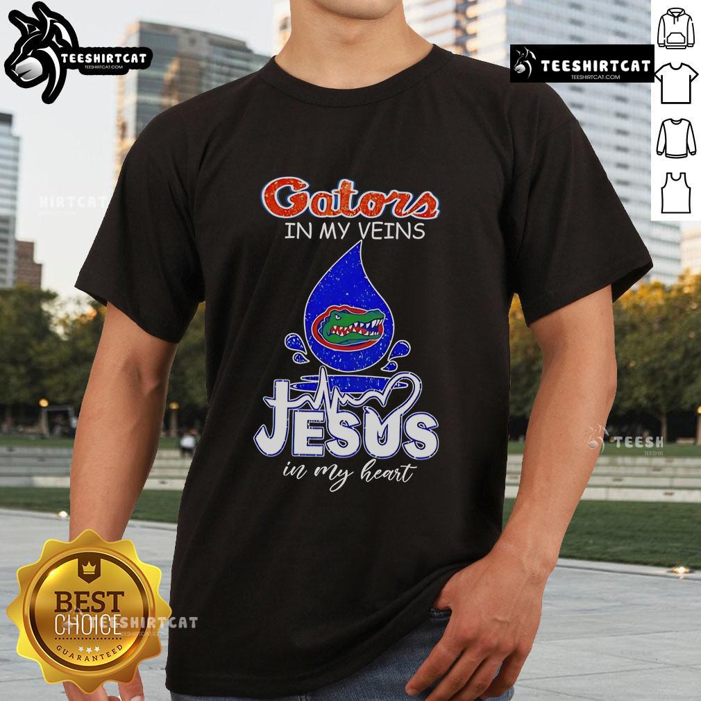Nice Florida Gators In My Veins Jesus In My Heart T Shirt Nice Florida Gators in My Veins Jesus in My Heart T-Shirt showcasing team spirit and faith in vibrant colors.