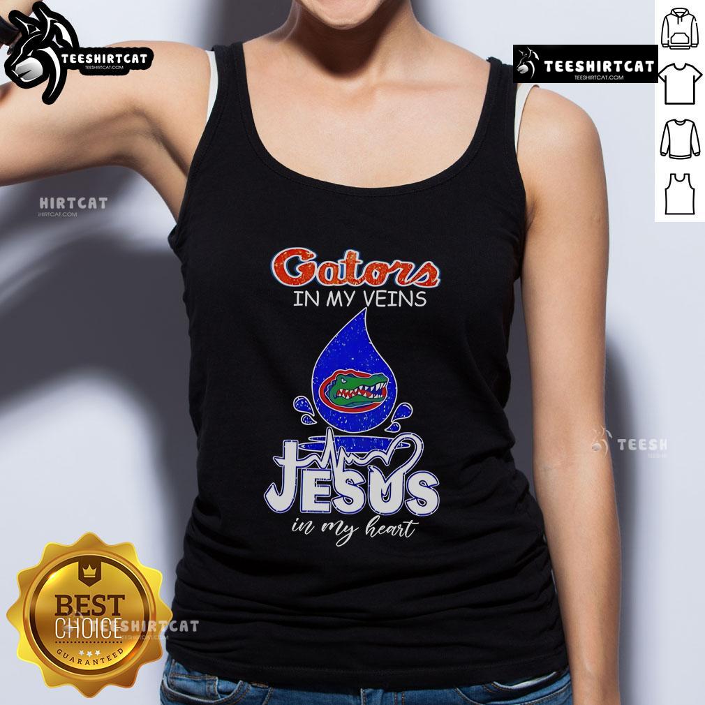 Nice Florida Gators In My Veins Jesus In My Heart Tank Top Nice Florida Gators in My Veins Jesus in My Heart tank top showcased on a model, perfect for Gators fans and casual wear.