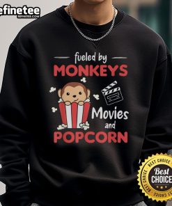 Cozy Nice Fueled By Monkeys Movies and Popcorn sweatshirt featuring a fun graphic design for movie lovers.