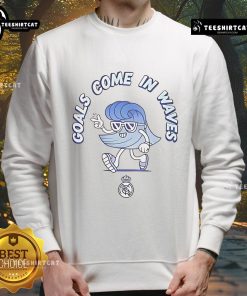 Stylish Real Madrid sweatshirt featuring 'Nice Goals Come in Waves' slogan, perfect for fans and casual wear.