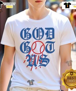 Nice God Got Us Los Angeles Dodgers T-Shirt featuring bold graphics and team colors for dedicated fans.