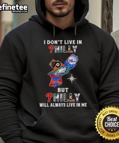 Alt Text: Cozy hoodie reading Nice, I don't live in Philly, but Philly will always live in me celebrating Philly sports teams.