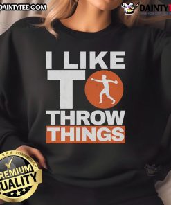 Track and field discus thrower sweatshirt featuring 'Nice I Like To Throw Things' design for athletes and sports fans.