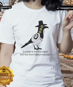 Funny ladies tee featuring a tiger design with a bird stealing its food, perfect for animal lovers and casual wear.