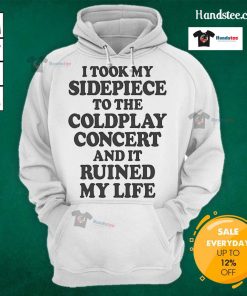 Person wearing a 'Nice I Took My Sidepiece To The Concert And It Ruined My Life' hoodie at a lively concert venue.