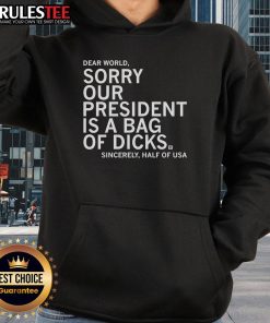 Jamie Bonkiewicz wearing 'Our President Is A Bag Of Dicks' hoodie, showcasing bold political statement and unique style.