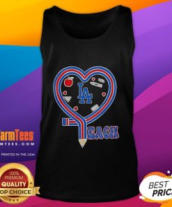 Alt Text: Woman wearing a Los Angeles Dodgers baseball tank top with a heart and pencil design, showcasing team love.