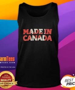 Stylish Nice Made In Canada tank top displayed on a wooden background, showcasing its unique design and quality craftsmanship.