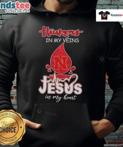 Nice Nebraska Husker in My Veins Jesus in My Heart Hoodie showcasing team spirit and faith in a stylish design.