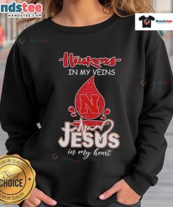 Nice Nebraska Husker in My Veins Jesus in My Heart sweatshirt displayed on a mannequin, showcasing team spirit and faith.