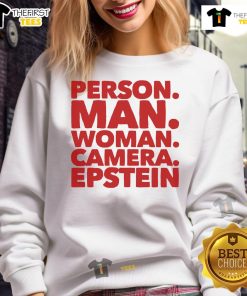A nice person wearing an Epstein sweatshirt poses for the camera with a smile, showcasing casual style and warmth.