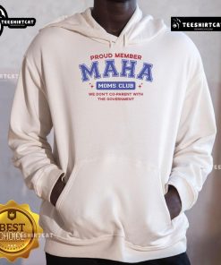 Alt Text: Proud member wearing 'Maha Moms Club' hoodie, showcasing 'We Don't Co-Parent With The Government' slogan.