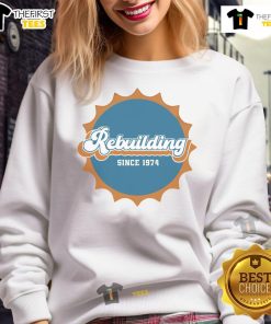 Vintage Nice Rebuilding Since 1974 Dolphins Logo Sweatshirt, perfect for fans of retro sports apparel and Miami Dolphins pride.