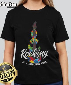 Nice Rocking to a Different Tune Autism Guitar Puzzle Ladies Tee featuring a colorful guitar and puzzle design.